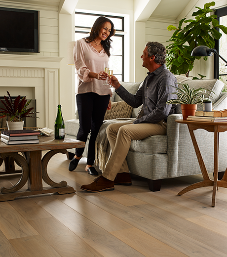 Couple sharing drinks from The Flooring Company in Sun City